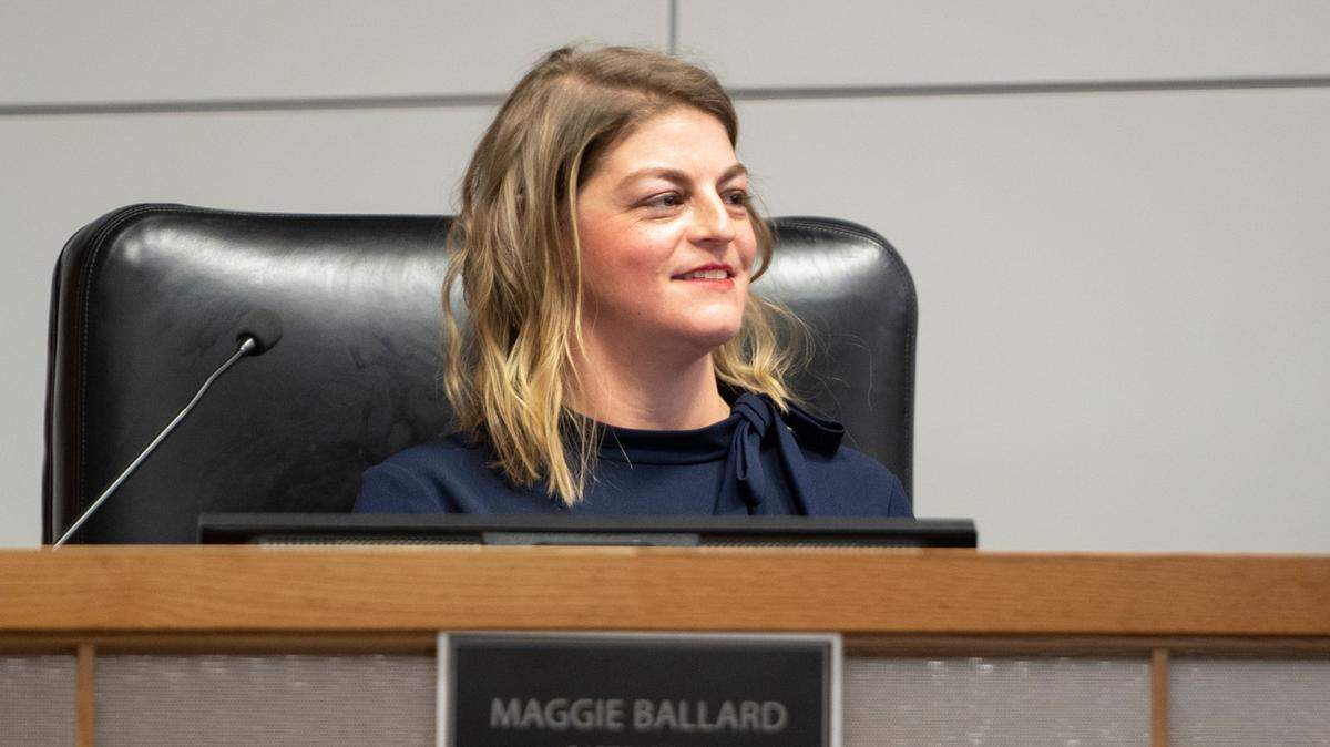 Wichita City Council member Maggie Ballard takes her seat for the first time after being sworn into office. (January 10, 2022)
