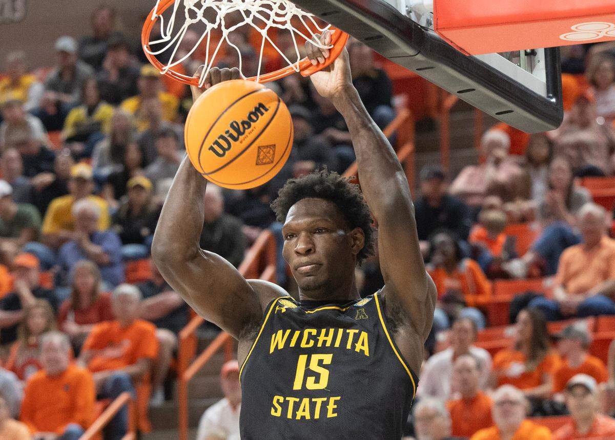 Wichita State’s Quincy Ballard dunks the ball during the the first half of their first round NIT game against Oklahoma State in Stillwater, Ok.