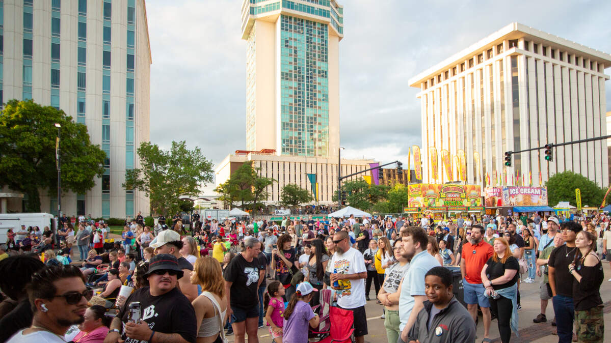 Riverfest attendees gather outside of Century II on Friday night for a concert from Tag Team. The hip-hop duo performed various hits, including “Whoomp! (There It Is).”