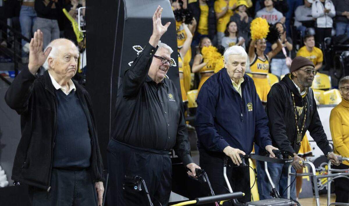 Four members of the 1964-65 Wichita State men’s basketball team that reached the Final Four were honored during Sunday’s game against Memphis. From left to right: Dave Leach, Bob Powers, Gerry Reimond and Melvin Reed.