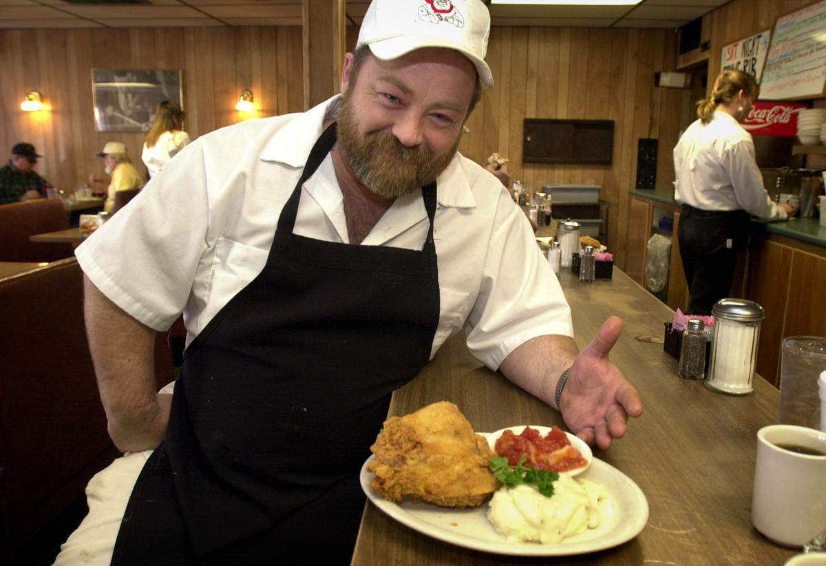 Ernie Fincher was photographed when his restaurant was new, back in 2001. He’s now fighting cancer and two strokes, and his son is trying to raise money to cover his medical bills.