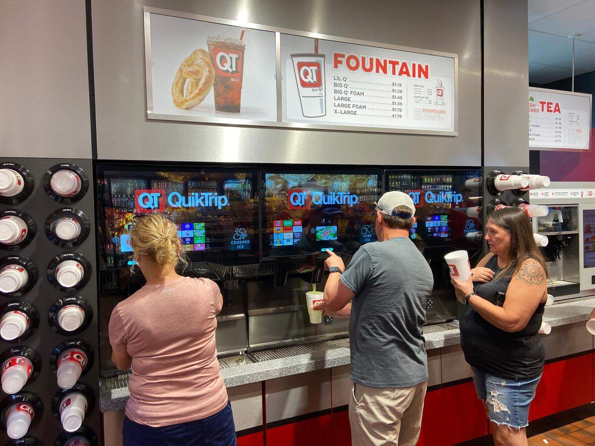 QuikTrip patrons check out the new beverage dispensers at the 29th and Maize Road store.