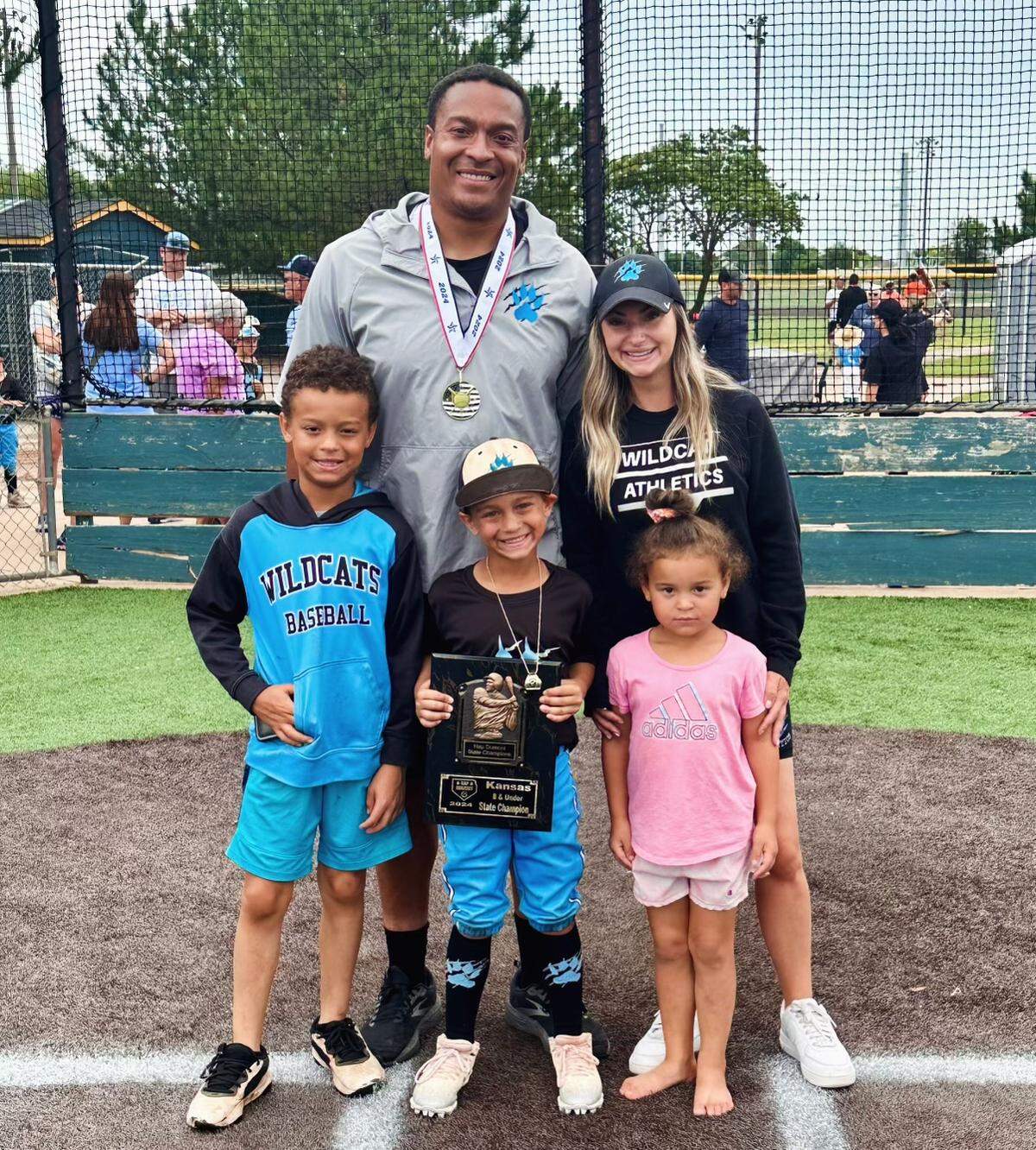 Former K-State Wildcats Jarell and Nikki Childs are expanding their Wildcat Athletics Academy through a new 50,000-square-foot facility. Pictured with them are three of their four children: Caiden, left, Rylen, center and Jaela.