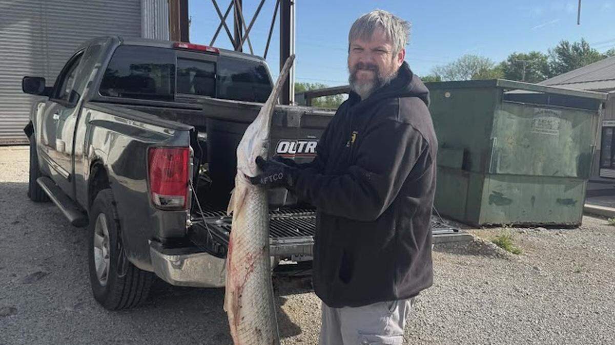 Michael Barnett with his record-breaking longnose gar.