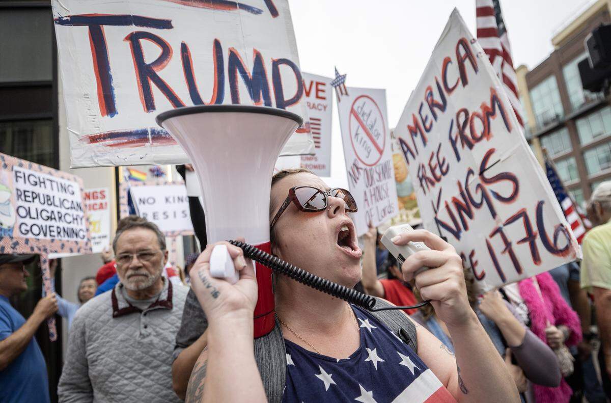 Protestors take part in a “No Kings” protest in downtown Wichita. The protest was the second such protest in Wichita in 2025. 