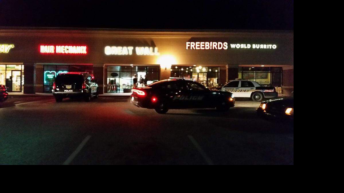 Wichita police investigate a robbery in the 400 block of North Hillside on Wednesday night.