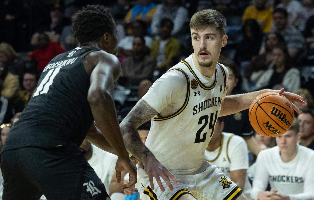 Wichita State senior Jacob Germany looks to score in his final home game at Koch Arena in the Shockers’ win over Rice on Saturday night.