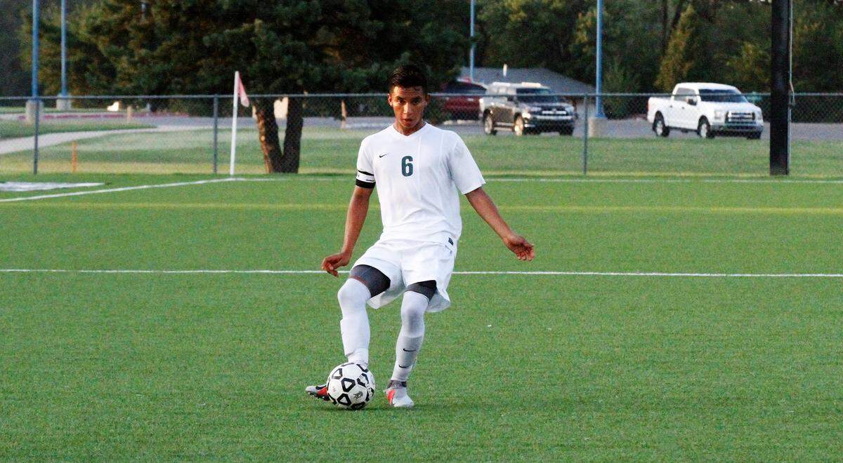 Carroll senior defender Aaron Valenciana delivers a pass down the wing during the Golden Eagles’ 3-0 win at Maize on Tuesday. (Aug. 28, 2018)