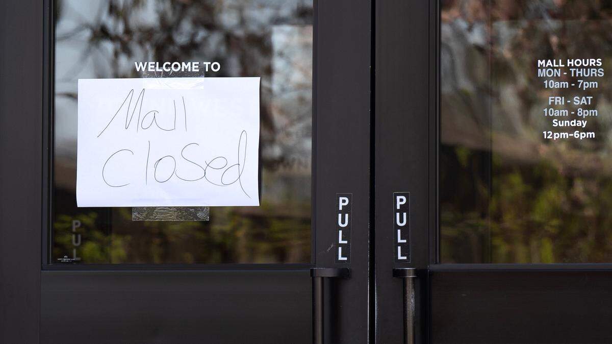 A sign on the north entrance of Towne West on March 28, 2024 tells customers that the mall is closed. Power to the mall is shut off for tenants. Outages have happened several times after the mall has not paid its electricity bill.