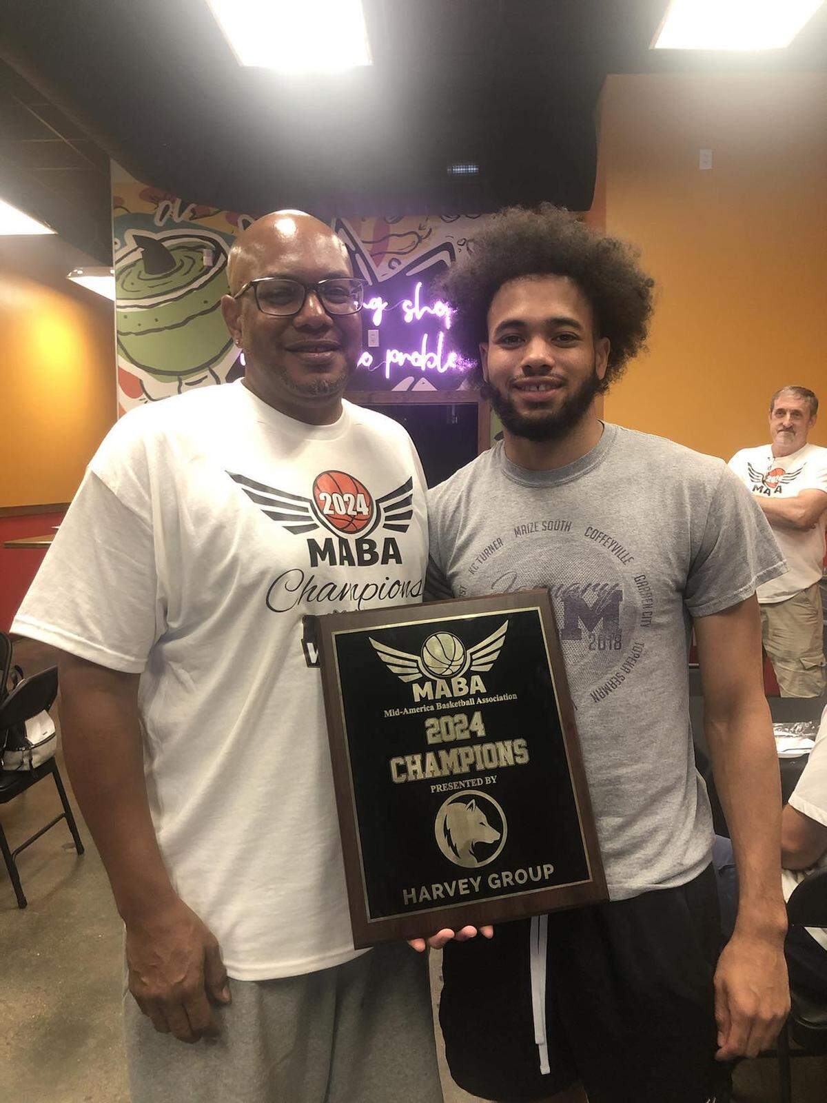 Johnny Murdock, left, and Jun Murdock, right, helped lead the Wichita Wizards to the franchise’s first league championship. Johnny was the team’s coach, while Jun was the league MVP.