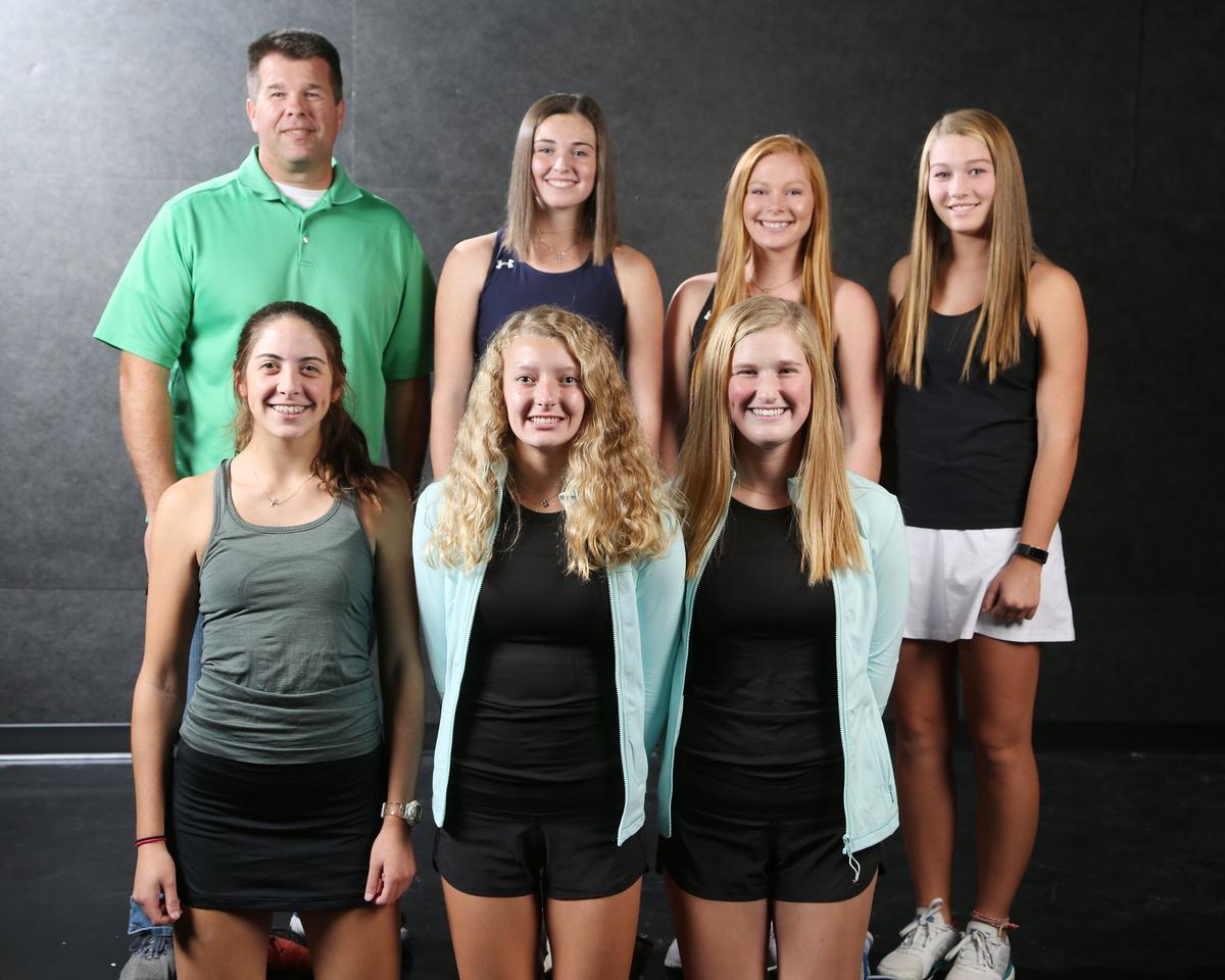All metro tennis team, front row: Brittany Steven, Bishop Carroll, Sydney Lair, Collegiate, Hannah Geoffroy, Collegiate. Back row: Darren Huslig, Bishop Carroll head coach, Clara Whitaker, Kapaun Mt Carmel, Kylie Martin, Hesston, Michaela Martin, Hesston. (November 7, 2018)