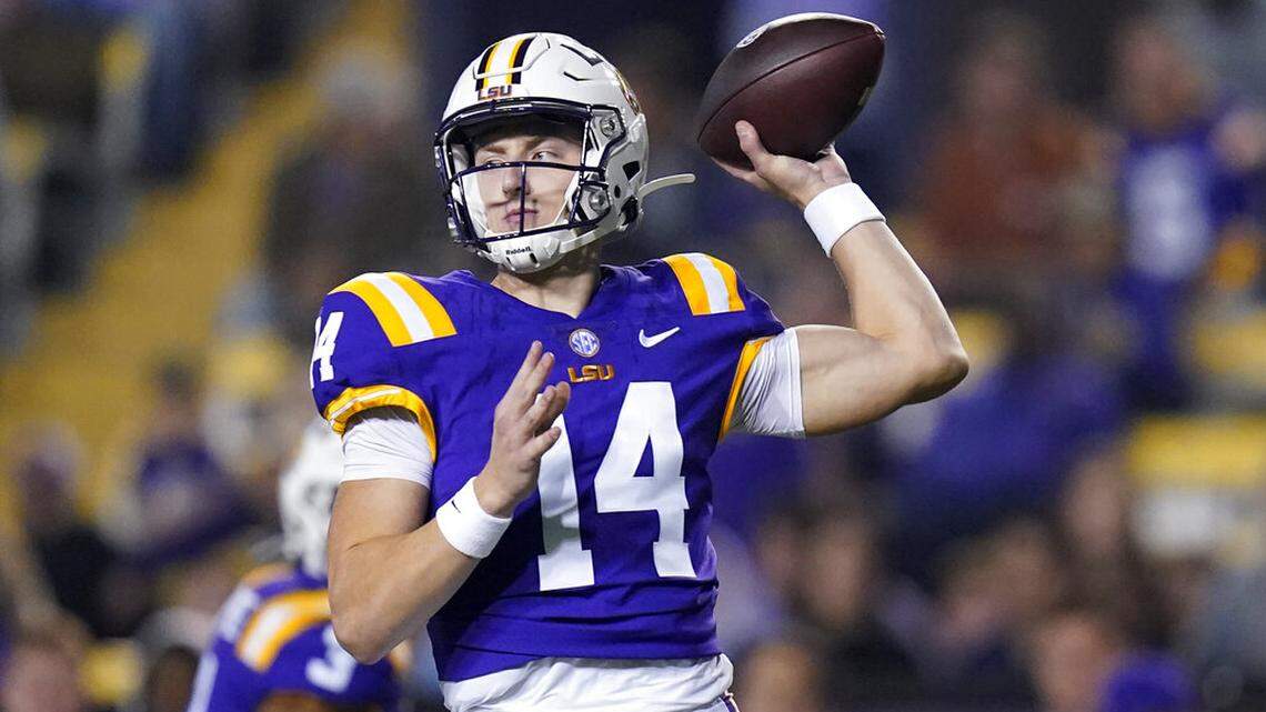 LSU quarterback Max Johnson (14) passes in the first half of an NCAA college football game against Louisiana-Monroe in Baton Rouge, La., Saturday, Nov. 20, 2021. (AP Photo/Gerald Herbert)