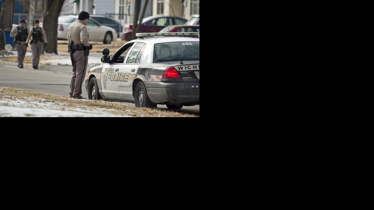 Wichita police investigate the scene of a shooting in the 1700 block of Northeast Parkway on Jan. 3, 2013. The victim drove himself to the QuikTrip at 13th and Oliver on Jan. 2 and told a customer he had been shot. The man was taken to Wesley Medical Center, where he later died. 

