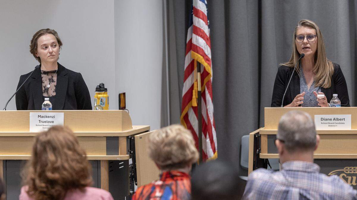 Mackenzi Truelove, left, and Diane Albert are running for a spot on the Wichita school board. The two took part in a candidate forum at Wichita State on Tuesday night.   