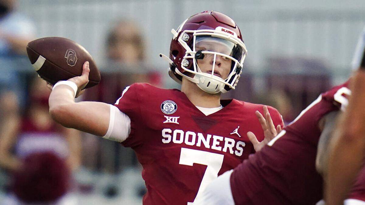 Oklahoma quarterback Spencer Rattler (7) throws in the first half of an NCAA college football game against Missouri State Saturday, Sept. 12, 2020, in Norman, Okla. He threw for 212 yards and one TD against Kansas on Saturday. (AP Photo/Sue Ogrocki)