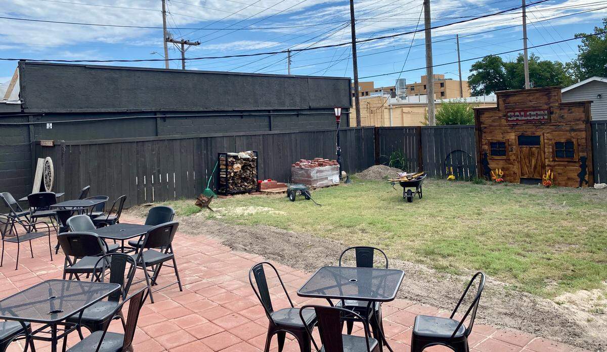The owners of The Cowboy Inn Saloon are finishing up their big beer garden in anticipation of Saturday’s grand opening.