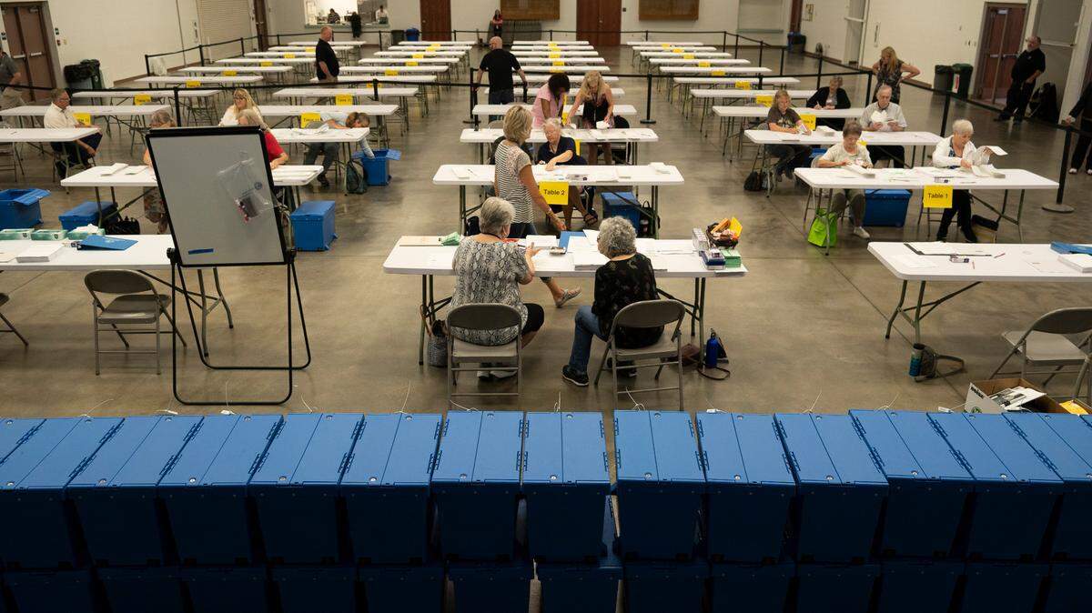 Bipartisan counting teams prepare to recount nearly 150,000 ballots at the Sedgwick County Extension Center on a constitutional amendment that would’ve removed abortion rights from the Kansas Constitution.