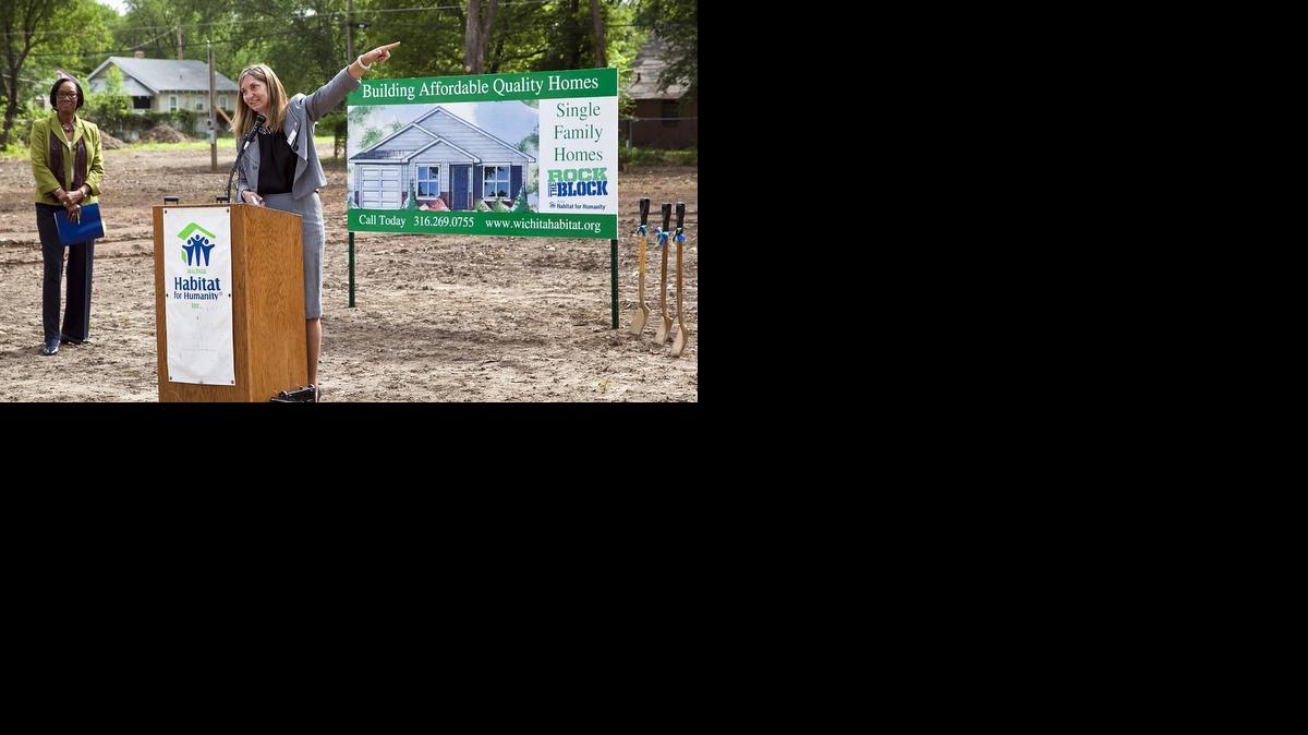 Ann Fox, executive director of Habitat for Humanity, right, and Wichita City Council member Lavonta Williams announce plans for building five homes in the 1200 block of Poplar. (May 30, 2014)

