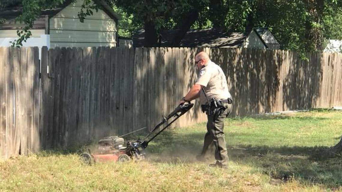 Officer Carey mowed a woman's lawn in Hutchinson after the person she hired didn't finish the job, police said.