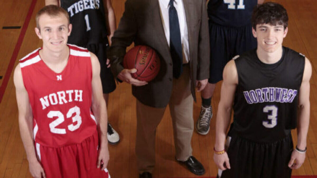 All-State boys basketball team. Front row: Wichita North's Conner Frankamp, BV Northwest's Clay Custer. Back row: Eisenhower's Trevon Evans, Scott City coach Glenn O'Neil, and Scott City's Drew Kite. (March 12, 2013)
