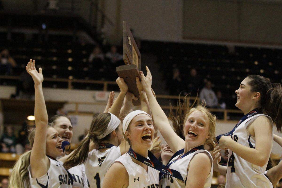 St. Thomas Aquinas hoists its fourth straight state title.