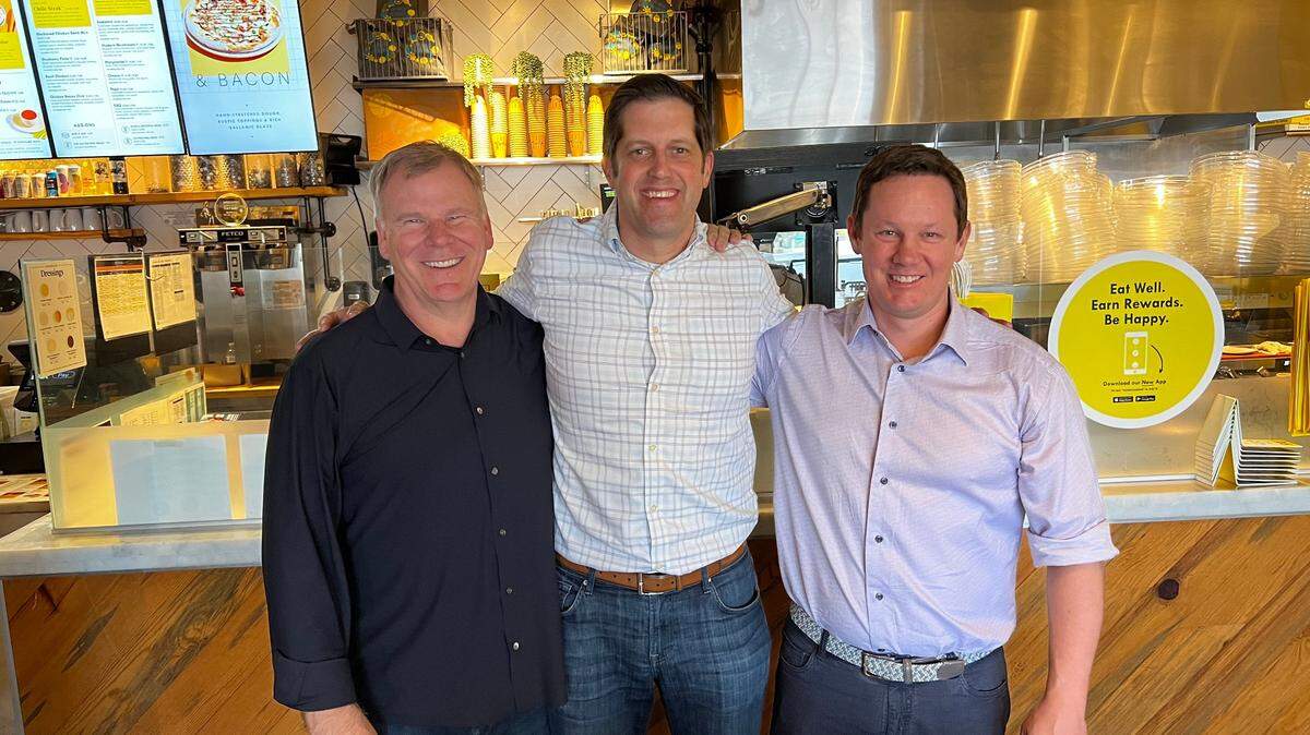 Thrive Restaurant Group CEO Jon Rolph, center, with Modern Restaurant Concepts CEO John Cywinski, left, and Modern Market Eatery co-founder Rob McColgan, right. Thrive has purchased the Modern Market Eatery brand.