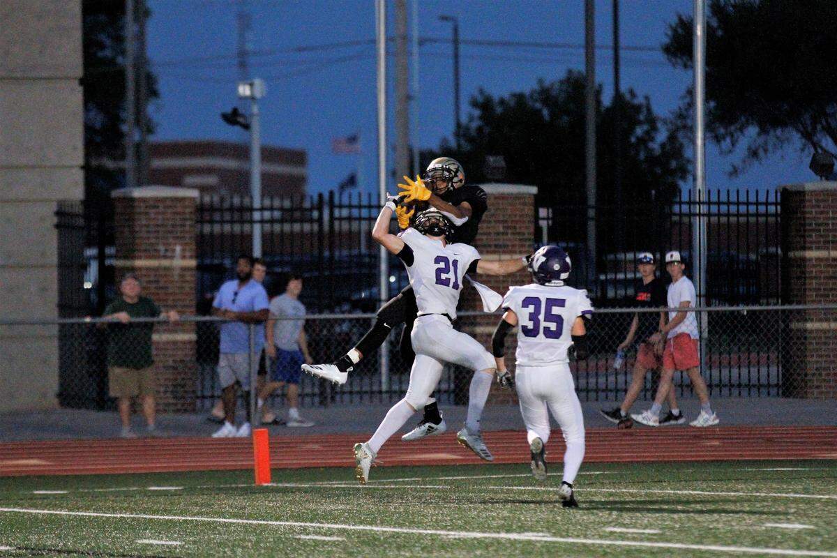 Andover Central junior receiver Xavier Bell goes up for a remarkable touchdown grab in the Jaguars 27-17 win over Valley Center on Thrusday night. (Sept. 20, 2018)