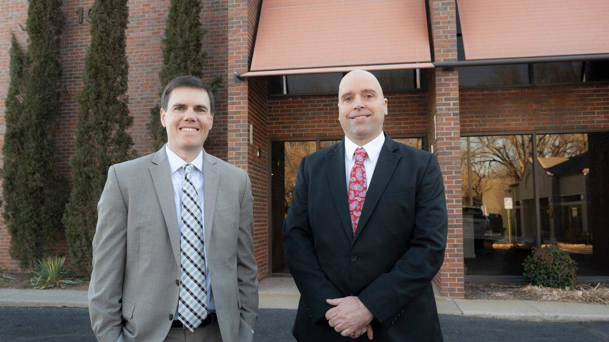 Joey Krsnich, left, and Wally Jensen have merged their ICT Health Insurance and Jensen Insurance Group to form ICT Insurance Group, and now the two are combining their offices into one new space at 9435 E. Central near Central and Webb. (January 13, 2022)