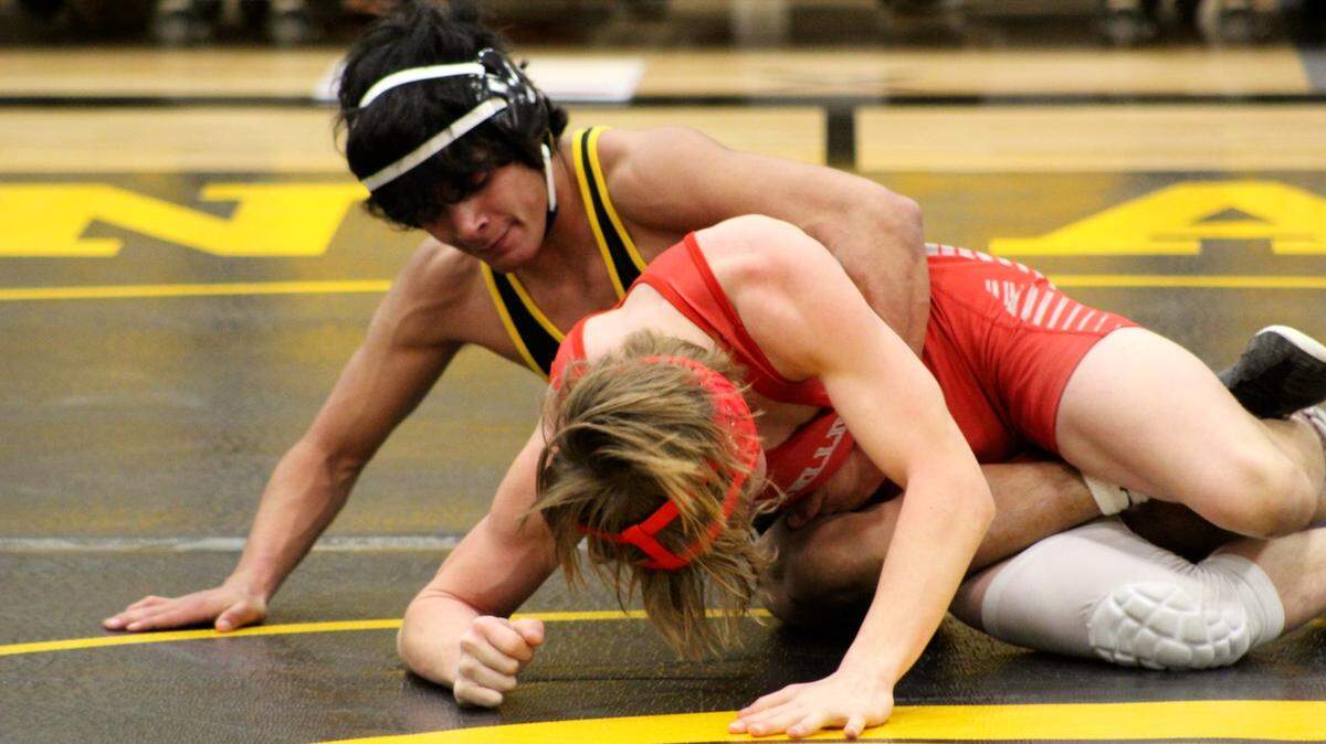 Andale senior Hector Serratos came through in a must-win match to win his third individual title and deliver the team state title to the Indians.