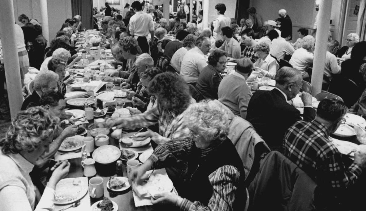 A photo published in 1987 shows crowds at the annual St. Paul’s United Methodist Church Chicken Noodle DInner.