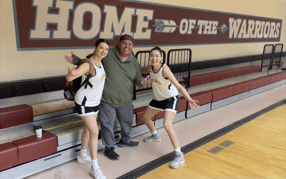 Analyss Benally, a 2016 Heights graduate who is pictured on the right, makes an appearance in the movie Rez Ball, which was released on Netflix on Friday. She poses here with Amber Midthunder (left) and Ernie Stosie (middle) while shooting the film.