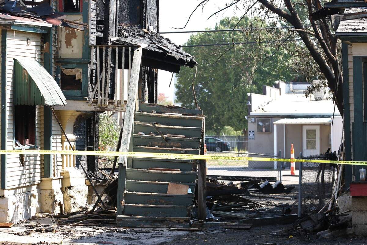The staircase of the two-story Victorian home, one of two homes two homes destroyed in a three-alarm fire Saturday night.
