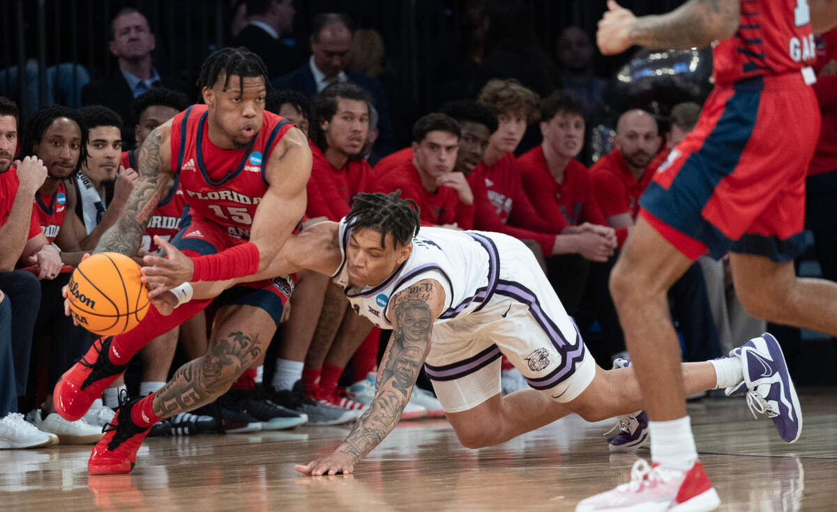Kansas State’s Keyontae Johnson was called for a foul while trying to come up with a loose ball against Florida Atlantic’s Alijah Martin during the second half of their east region final game at Madison Square Garden on Saturday night.