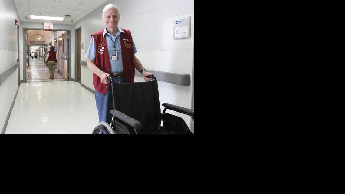 James Chitty, a 92-year-old volunteer at the Dole Veterans Administration Hospital, donates his time by helping patients get around at the facility. (Feb. 12, 2014) 

