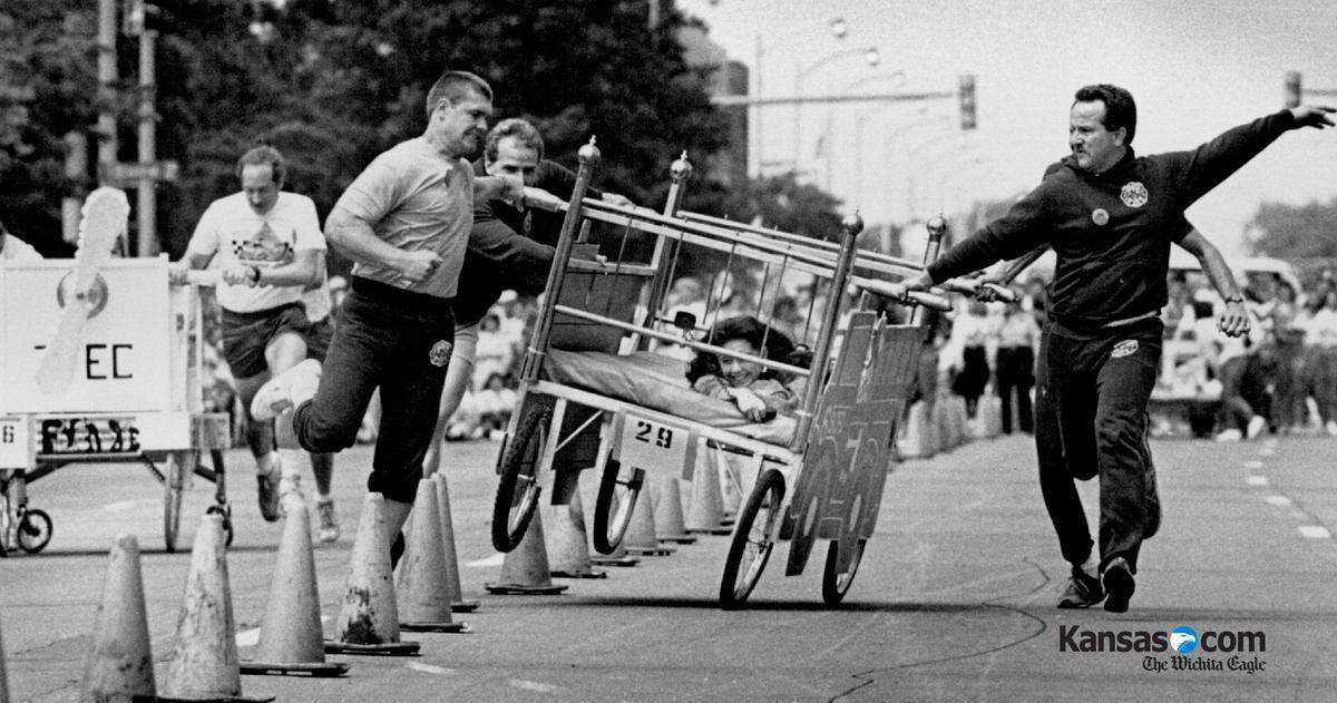 The Sedgwick County Firefighters team lose control of their bed during Bedlam 500 on Main Street between Central and Third Street at the 1989 Wichita River Festival. Although they lost control of the bed they went defeated the Air Midwest Airlines team with a time if 19.78 seconds.