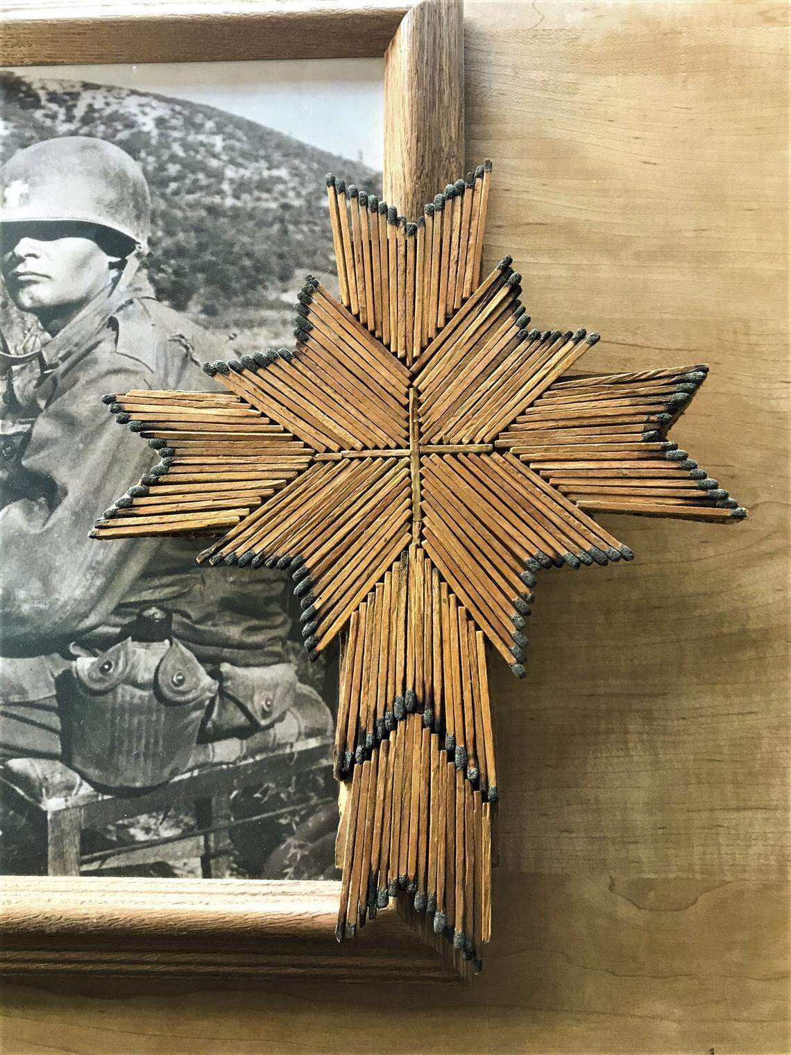 Bessie Kapaun lit a candle every week while praying for the return of her son Emil from a North Korean POW camp. She collected all of the burnt matches she used to light the candle and had them made into a cross.