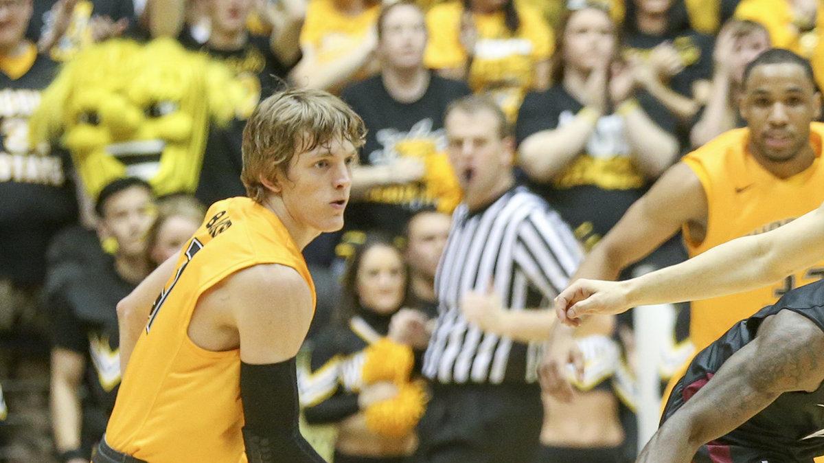 Wichita State's Ron Baker, left, and Fred VanVleet pressure Illinois State's Anthony Beane in the second half at Koch Arena. (Feb. 11, 2014)