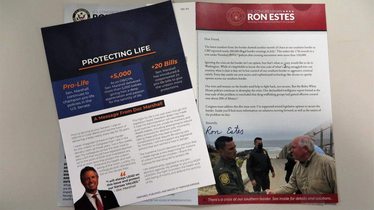 Mailers sent at public expense by Sen. Roger Marshall, left, and Rep. Ron Estes.