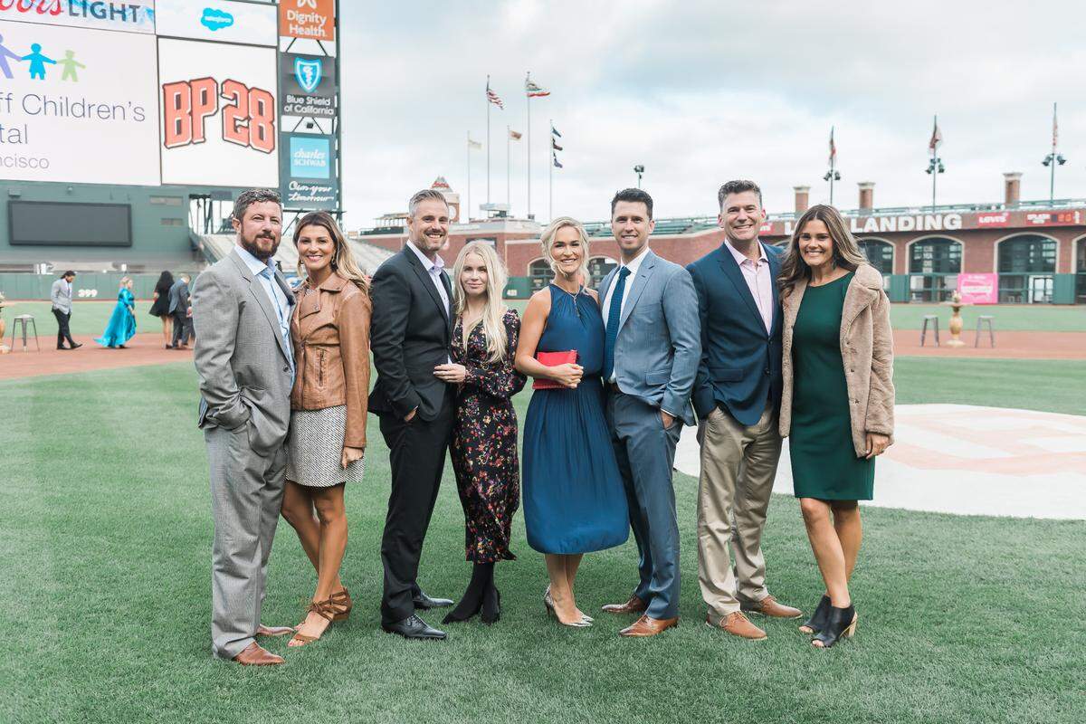 Buster Posey and his wife, Kristen, pictured middle-right, host an annual gala with their charity foundation, BP28, at the San Francisco Giants’ field to help raise funds and awareness for pediatric cancer.
