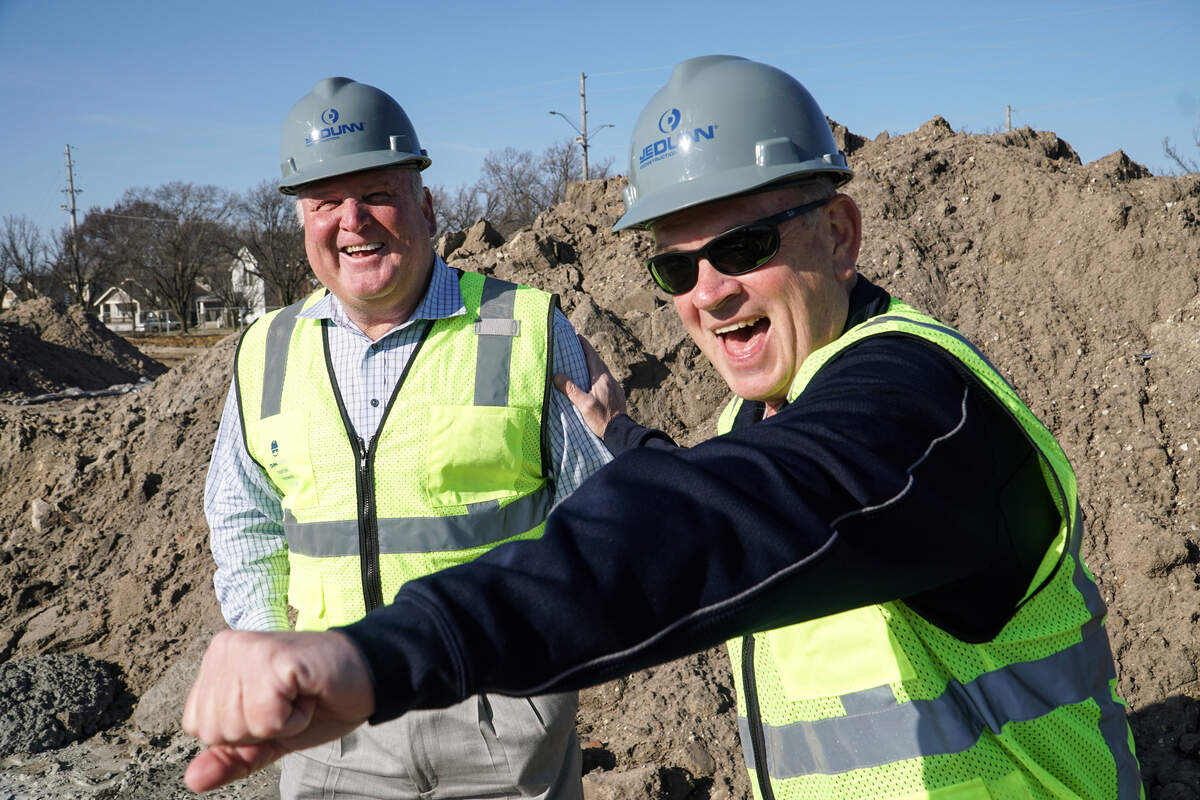 Wichita baseball president Jay Miller, left, talks with Baby Cakes owner Lou Schwechheimer while they check out the progress on the baseball stadium construction. (March 18, 2019)