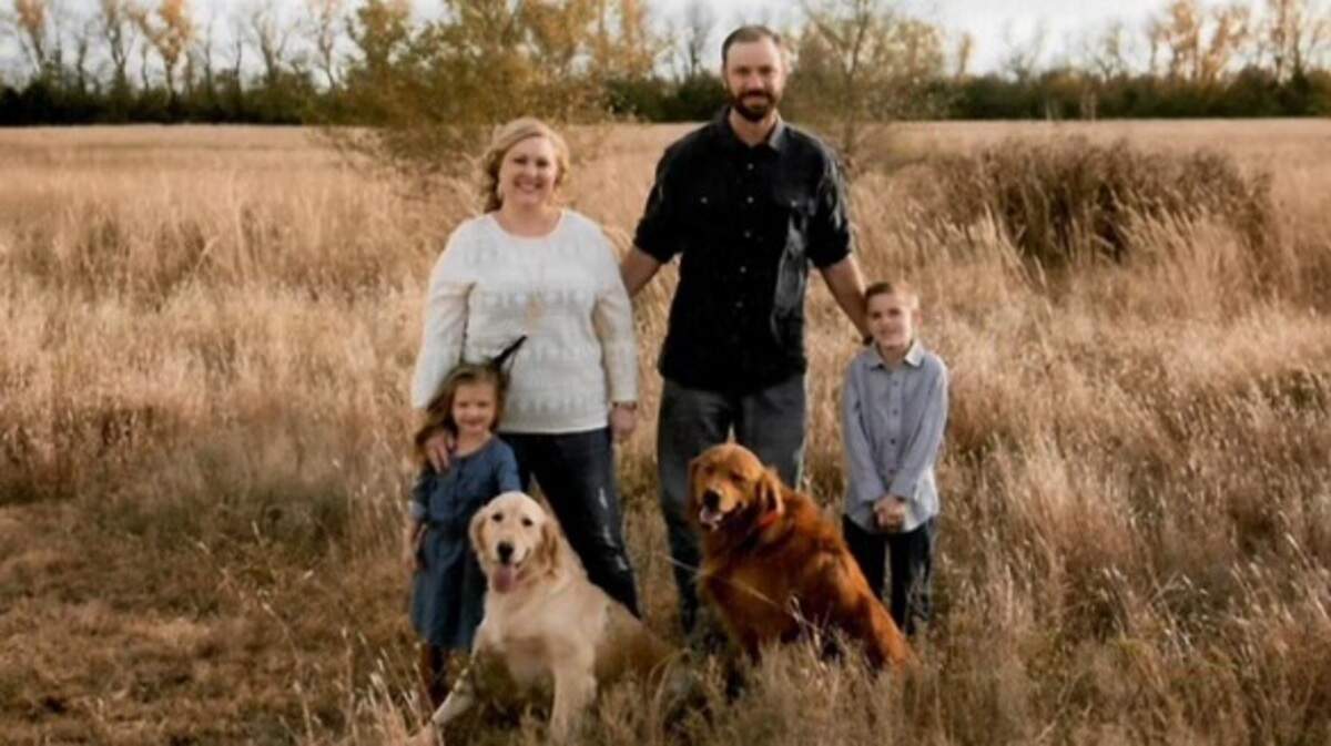 Michael and Jennifer Schroeder are expanding beyond their Smoots Creek Kennels with the new Camp Bow Wow boarding business in Goddard. Pictured with them in this photo, which is a few years old, are their children, Ella, left, and Gage, along with the golden retrievers, CiCi, left, and Scout, who helped them start Smoots Creek Kennels.