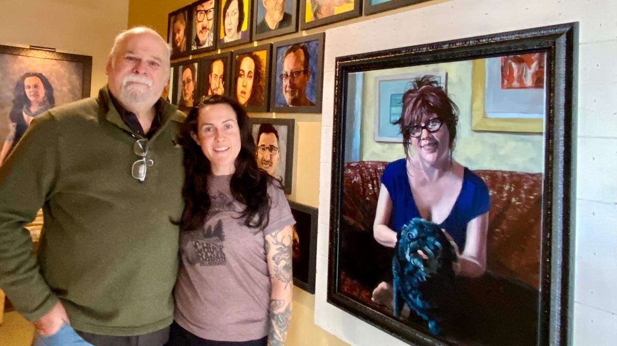 Artist Richard Davies, left, was commissioned by Tanya’s Soup Kitchen owner Kelly Rae Leffel, right, to create portraits of staff members to go along with a famous painting he did of late owner Tanya Tandoc.