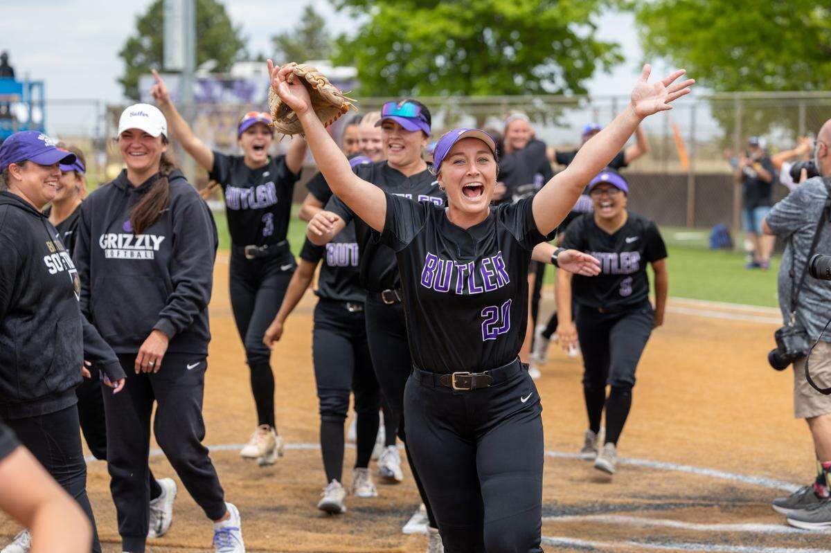 Butler star Kylie Forney, an Andover grad, celebrates following a win this season. The Grizzlies punched their ticket to the NJCAA World Series later this month by winning the Region VI championship.