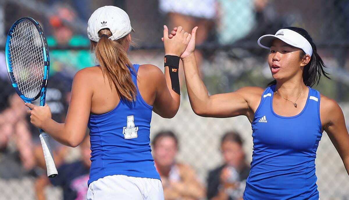 The Andover doubles team of Elizabeth Gaddis (left) and Nadia Kaewsai (right) won the Class 5A doubles championship this season.
