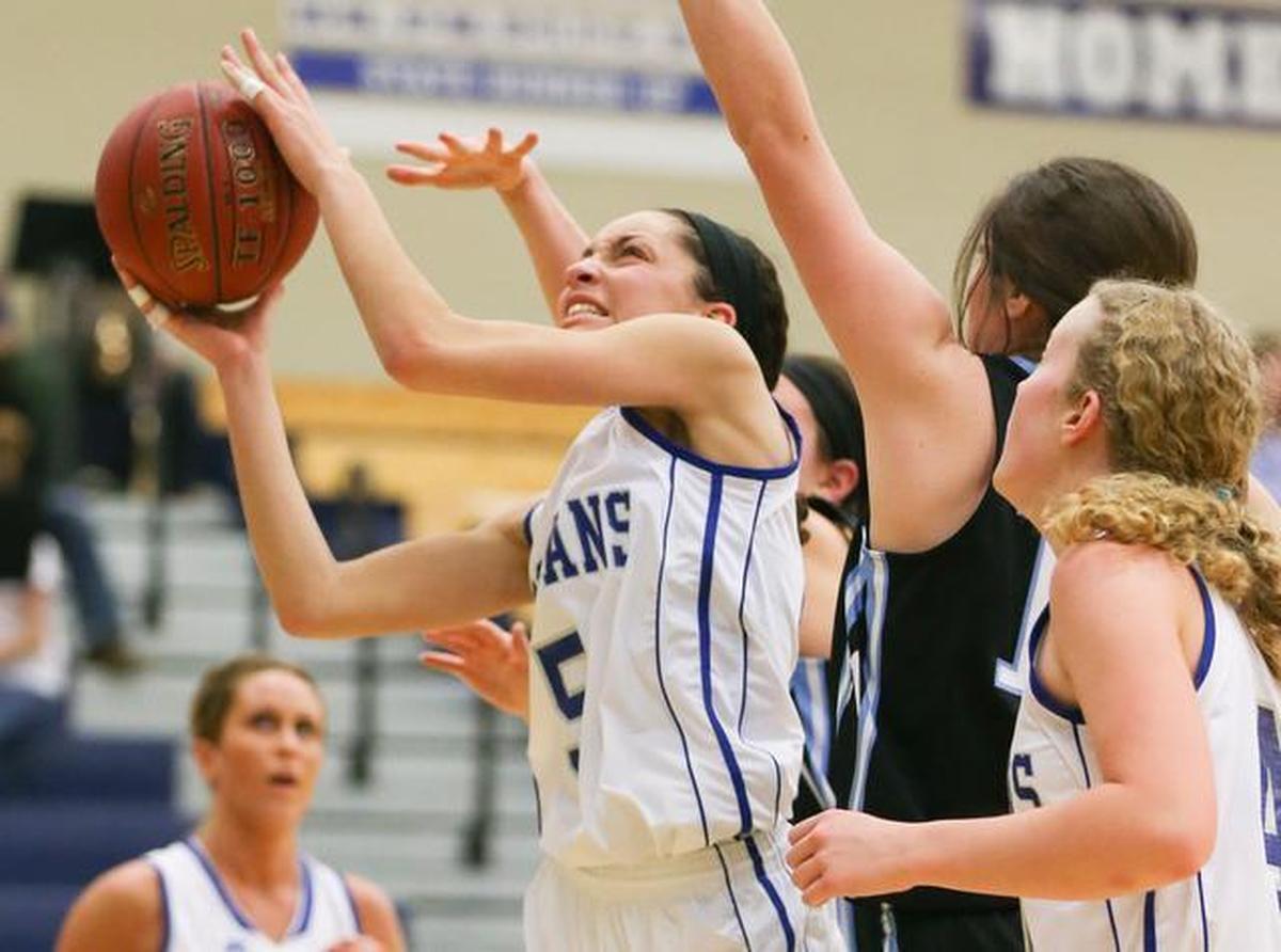 Andover’s Jaylyn Agnew drives to the basket against Eisenhower last season.