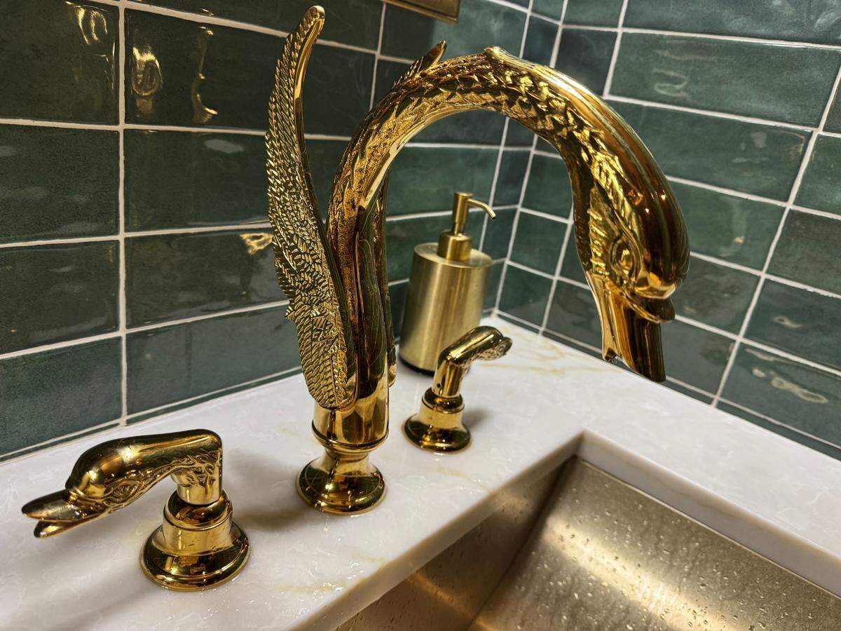 The water faucet in KVH’s women’s restroom has the shape of a golden swan.