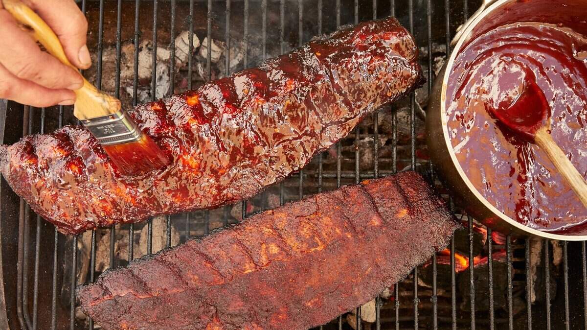 Jayhawk Double-Clutch Pork Ribs are cooked in the oven then finished on the grill.