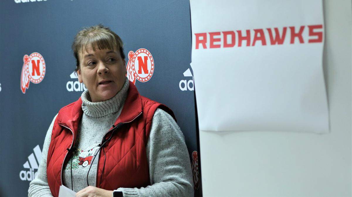 Wichita North High School principal Stephanie Wasko announces the school’s new mascot during a news conference at the school Wednesday.