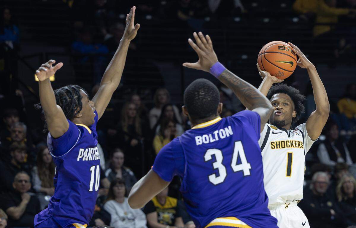 Wichita State’s Kenyon Giles hits one of his three three-pointers in the first half against Prairie View A&M on Saturday at Koch Arena.