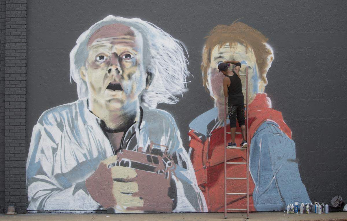 The “Back to the Future” mural was added to the side of the building at Seneca and Maple when an arcade was taking over the space in 2018.